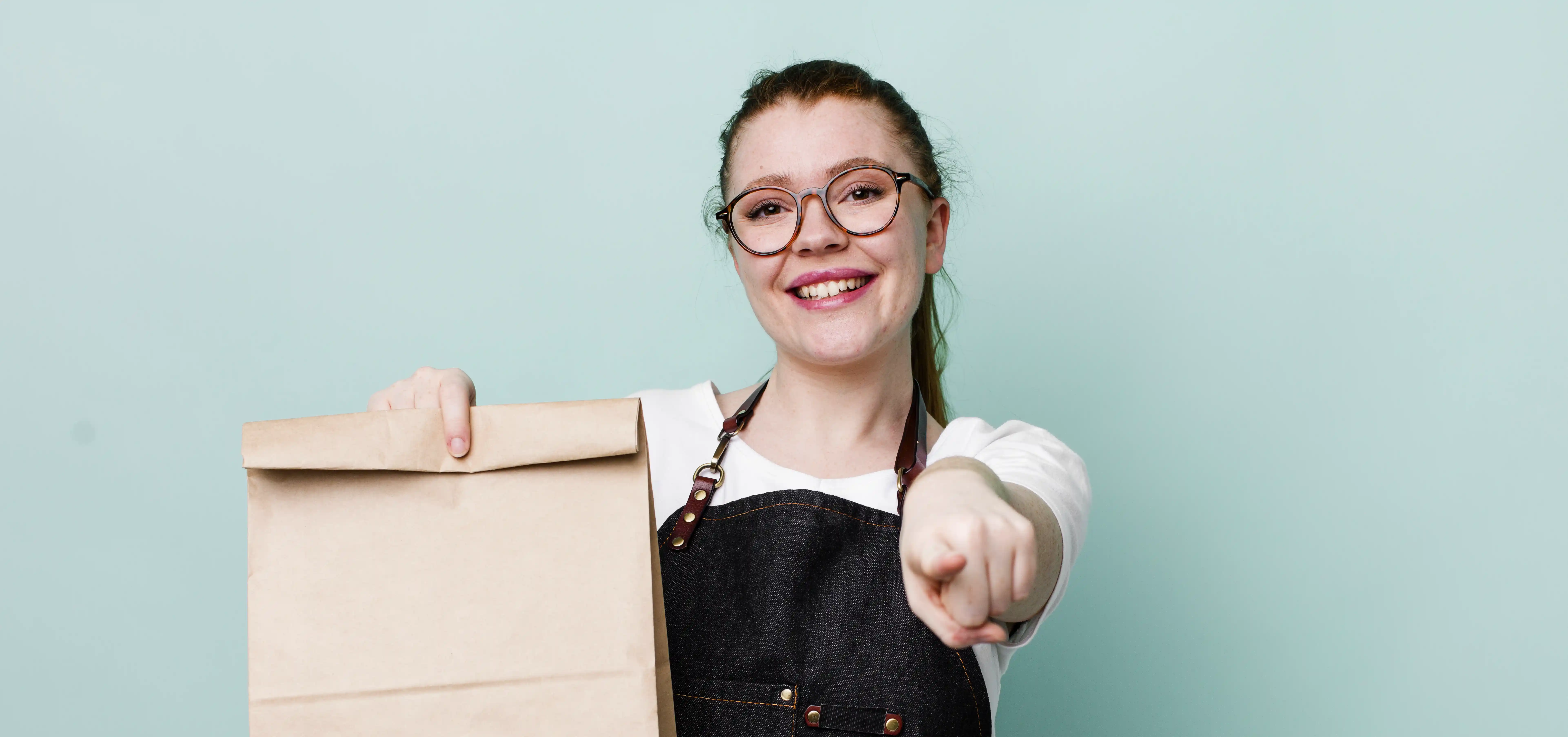 Woman pointing to you to register your children